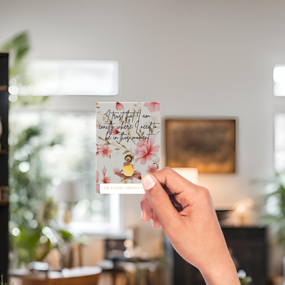 Affirmation quote cards displayed in a calm feminine workspace with luxury decor
