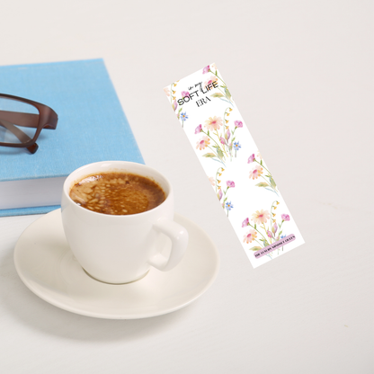 High-definition printable bookmark on a kitchen counter beside a cup of tea and a book.