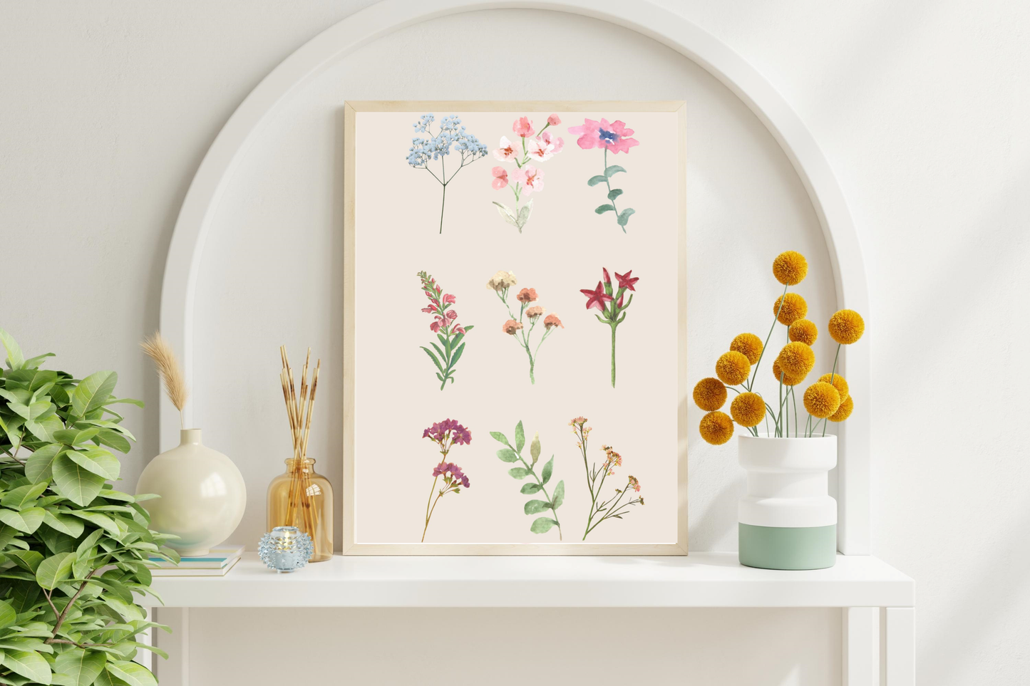 Floral printable wall art framed above a stylish shelf in a living room