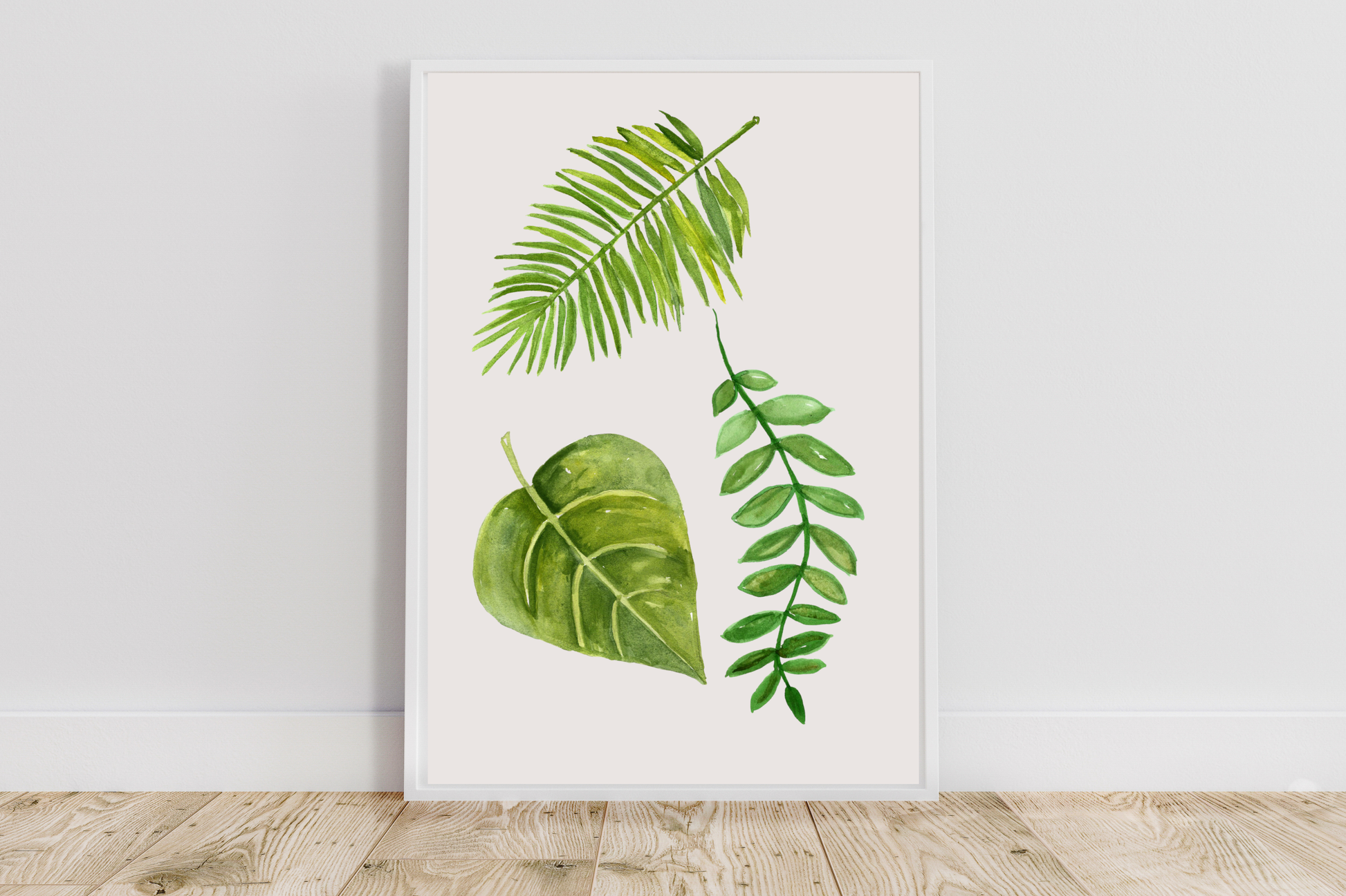 Green botanical art print in a modern minimalist living room with natural furnishings