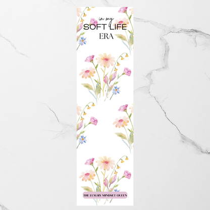 Relaxing printable bookmark with a positive quote displayed on a marble table