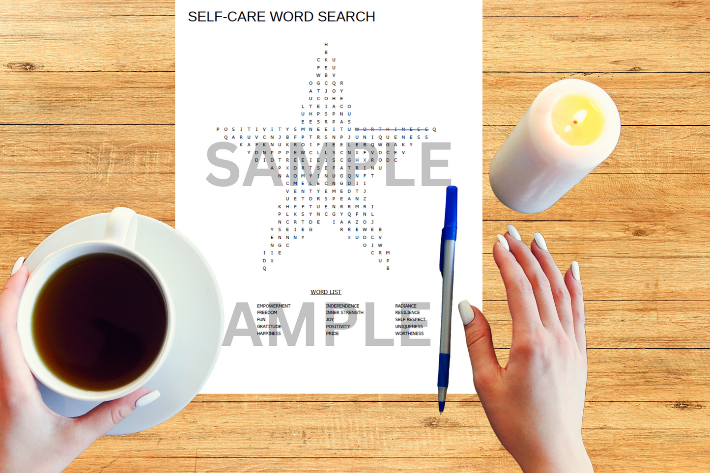 Star-shaped motivational printable for soft life lifestyle shown on a table with a cup of coffee and a candle