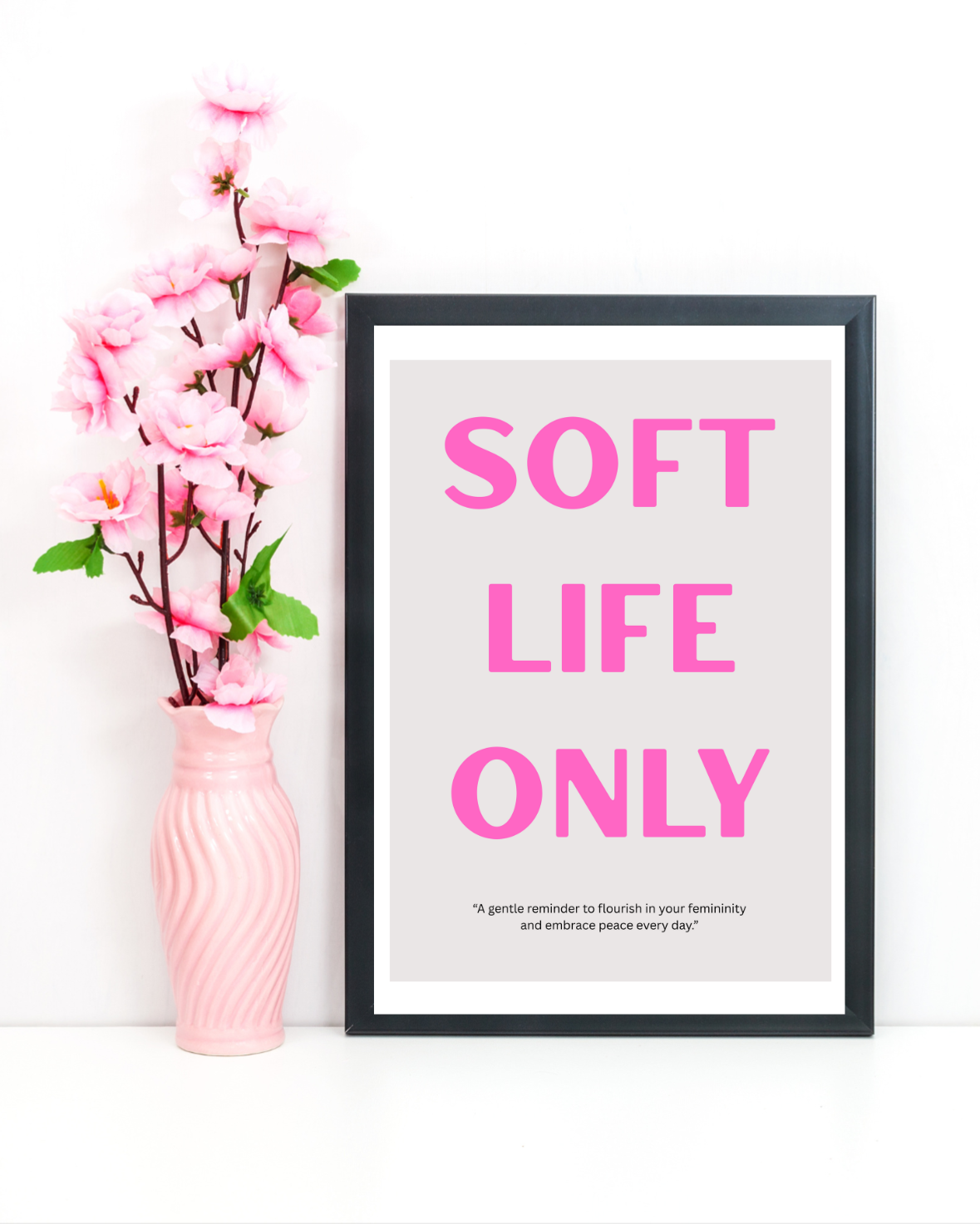 Feminine home office styled with SOFT LIFE ONLY motivational wall art in pink and grey
