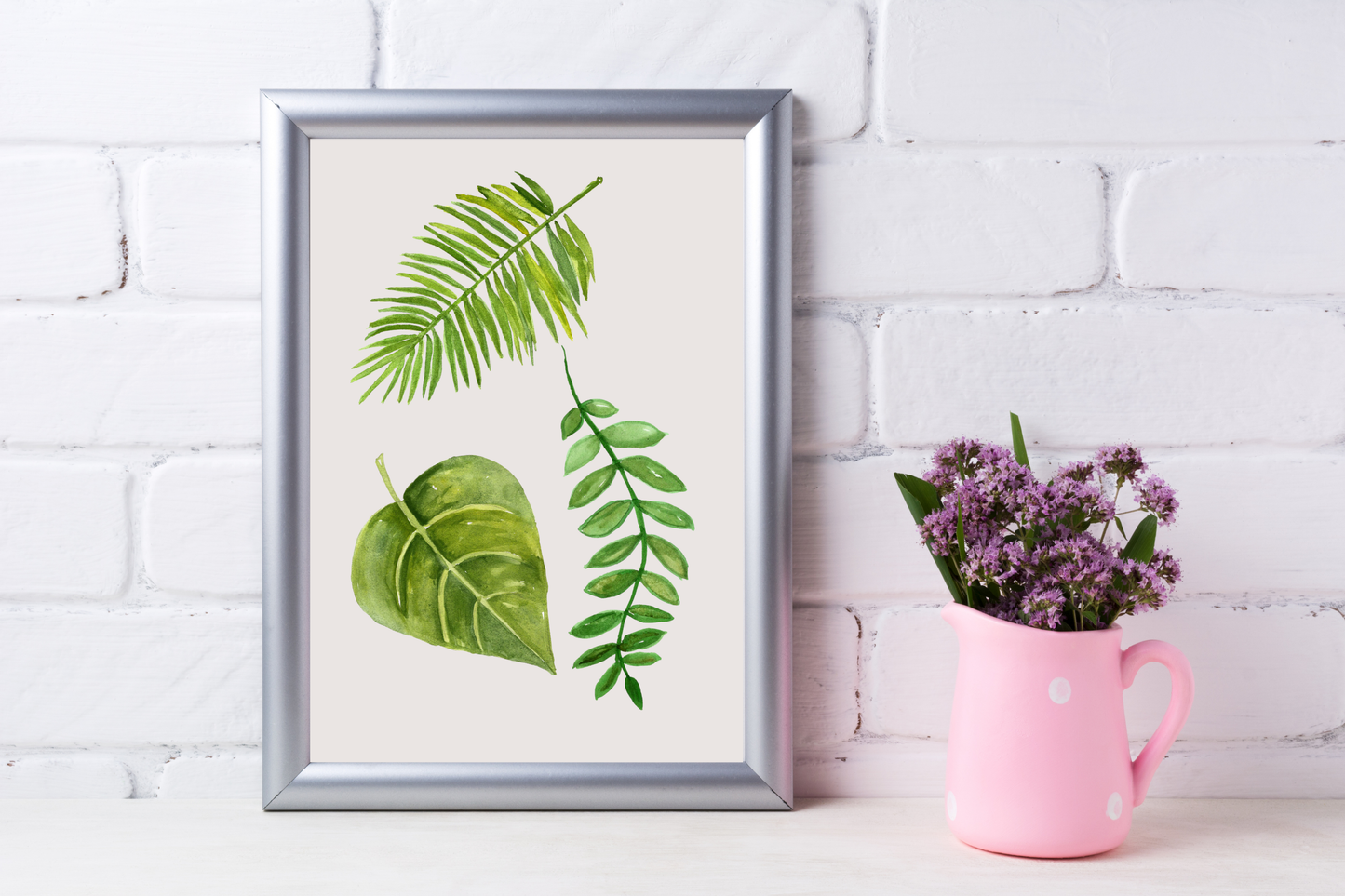 Watercolour botanical wall art displayed in a bright kitchen with natural home décor